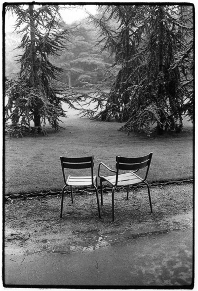Chairs in Jardin du Luxembourg, 1984-87. 15 photographs, possibly more about human relations than about some chairs in a parc in Paris